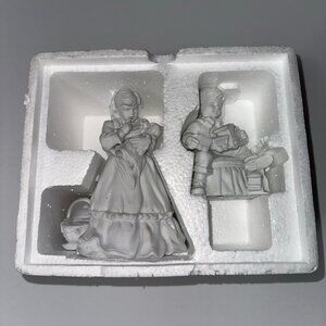 2 christmas winter silhouette figurines